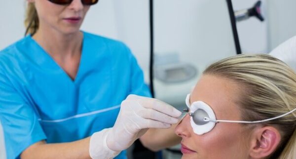 Dermatologist with a patient in cosmetic clinics in the UK